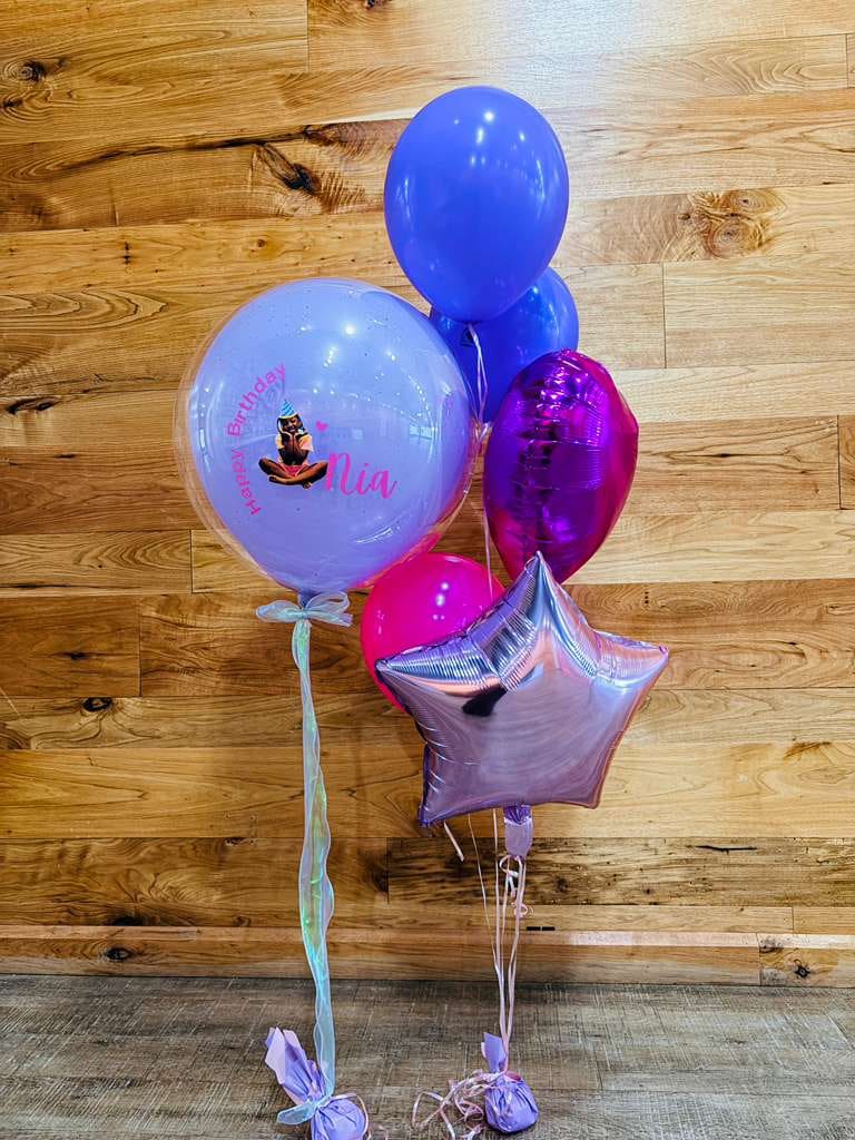 Purple, pink and silver birthday balloon bouquet with a personalized number balloon